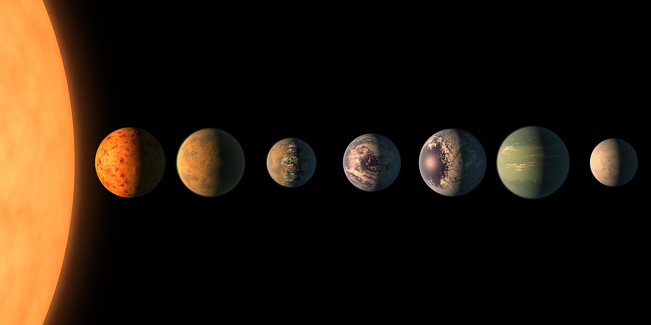 Artist’s concept of seven planets in a row beside the edge of a glowing orange star, against black space