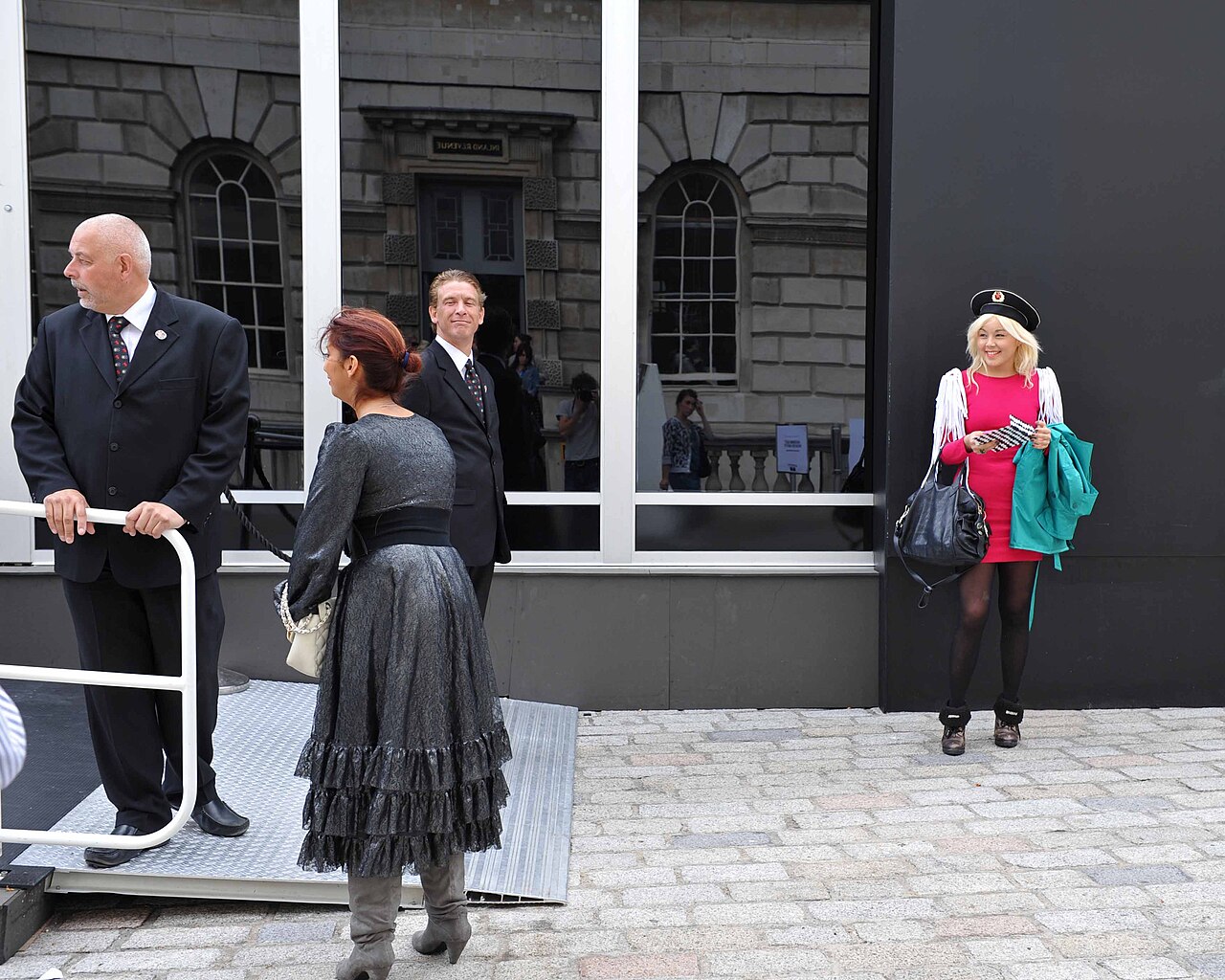 People arriving at a London Fashion Week show at Somerset House in London