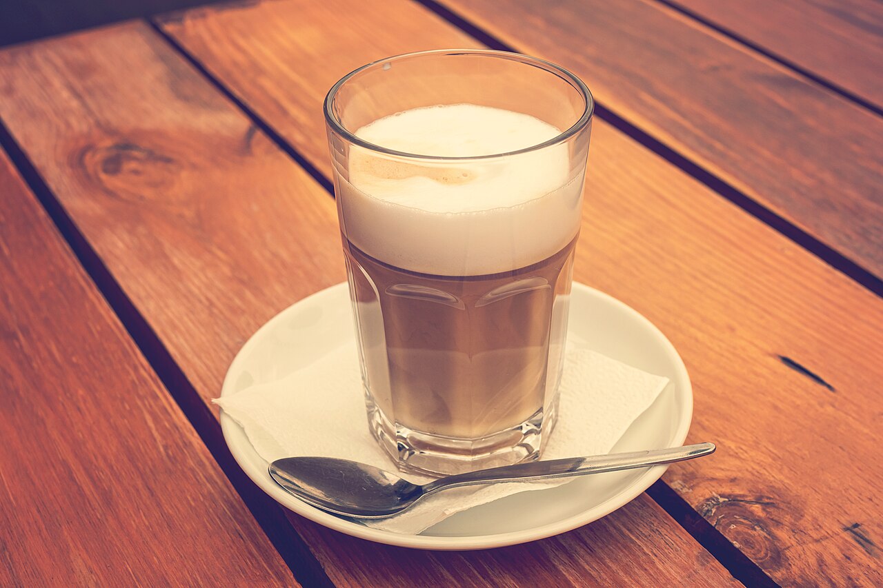 A cup of coffee on a wooden table