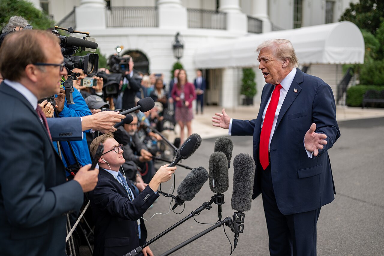Donald Trump speaking to reporters on the South Lawn of the White House in September 2025