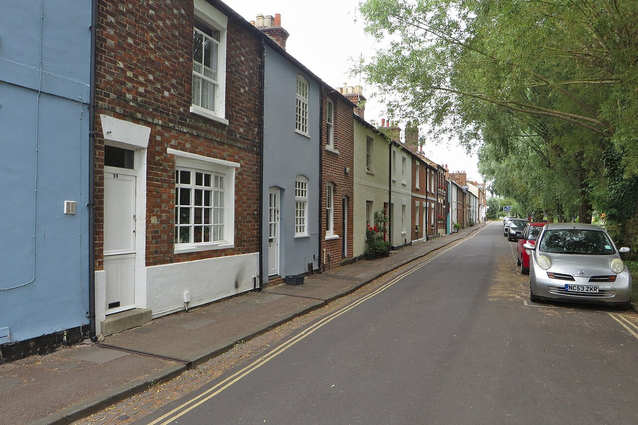 A row of terraced houses on a residential street in the United Kingdom