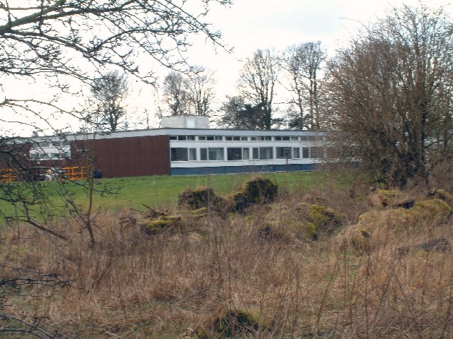 A hospital ward with beds, similar to those run by an NHS trust