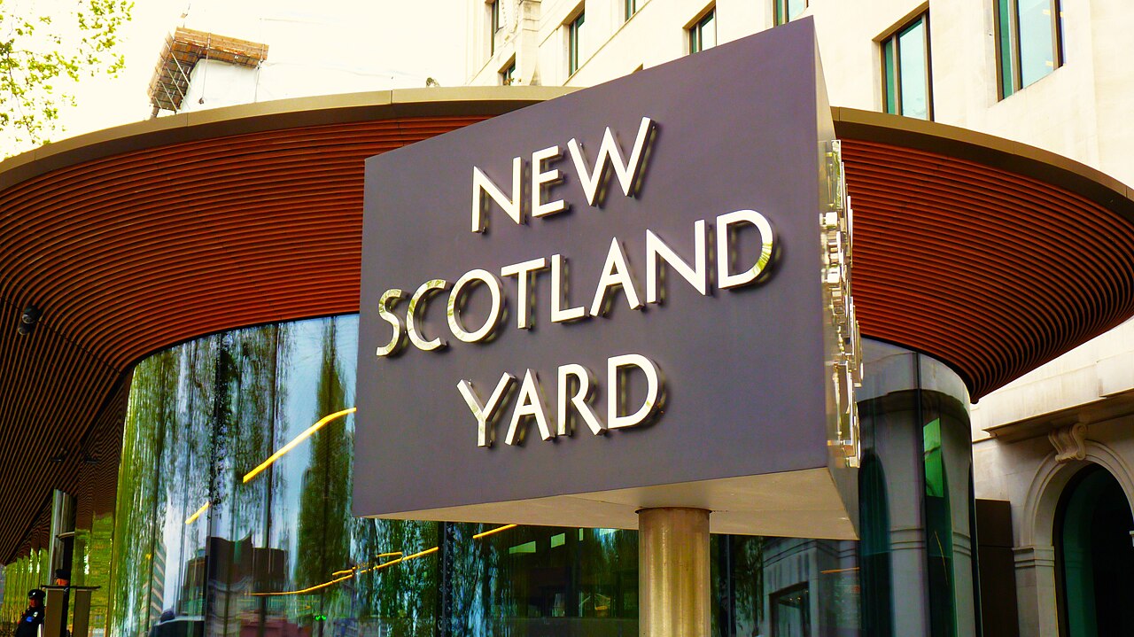 The rotating New Scotland Yard sign outside the Metropolitan Police headquarters in London