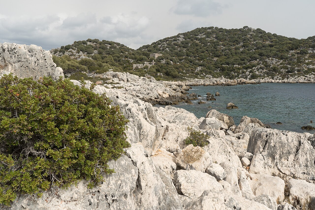 Rocky coast and a sheltered bay on Kekova Island, off the southern coast of Turkey