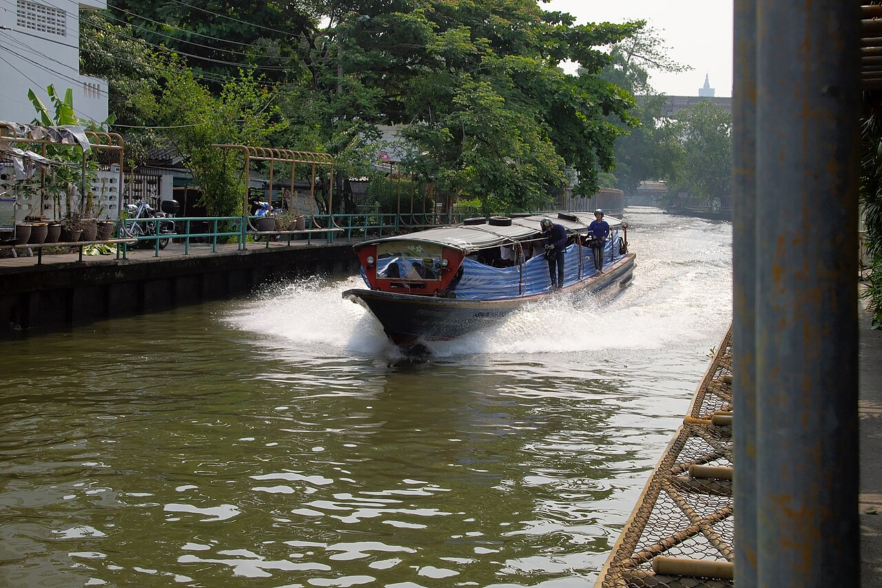 A passenger boat speeds along Khlong Saen Saep, one of the canals that run through Bangkok